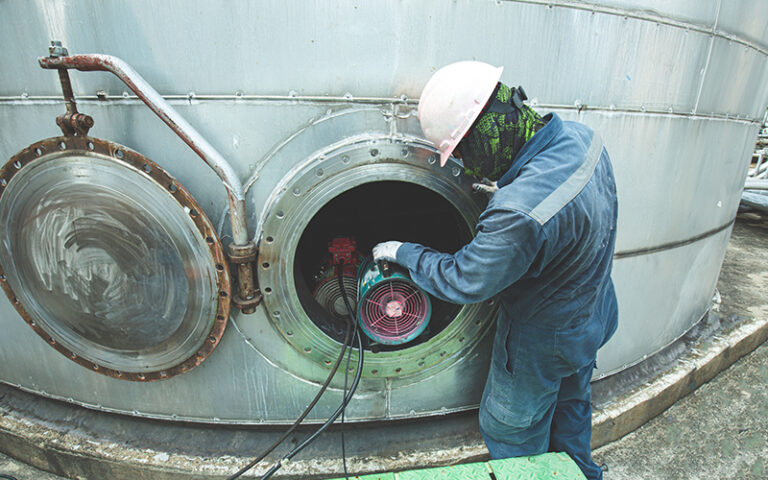 cómo limpiar un tanque industrial